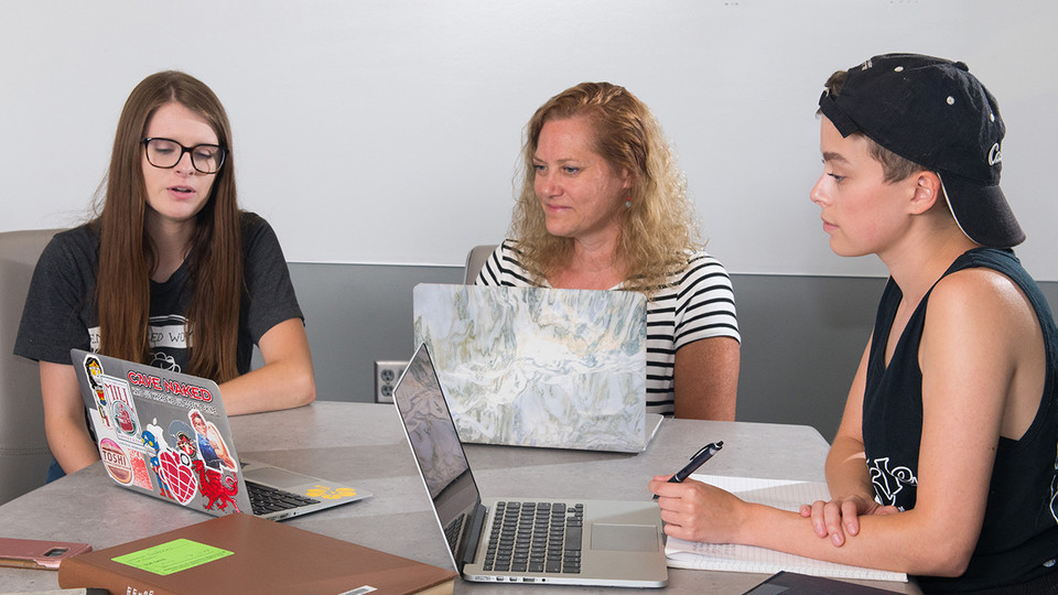 Rachel Gordon, Beverley Rilett and Megan Ekstrom discuss the George Eliot Archive during a meeting June 15 in the Adele Hall Learning Commons at Love Library.