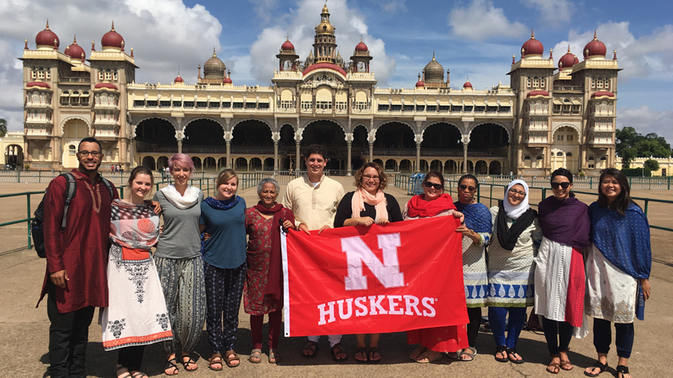 Photo Credit: Group studying abroad with N flag