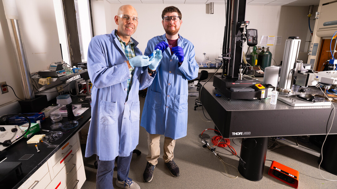 Morin and colleague in lab