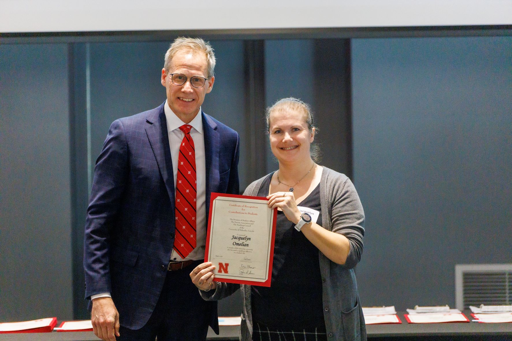 Dean Mark E. Button and Jacquelyn Omelian