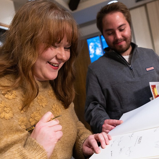 English student and instructor at book event