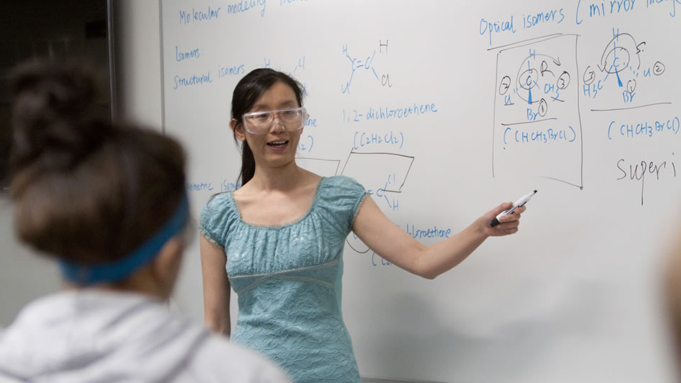 Instructor in front of whiteboard