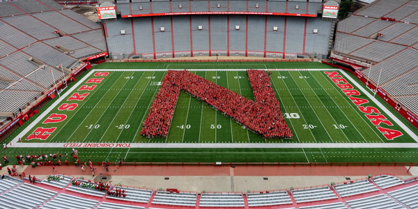 Students form the Class of 2025 “N” on the Memorial Stadium field on August 20