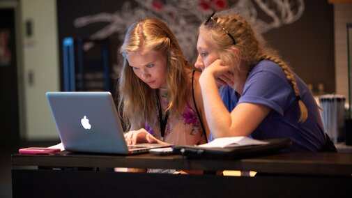 Students using a laptop