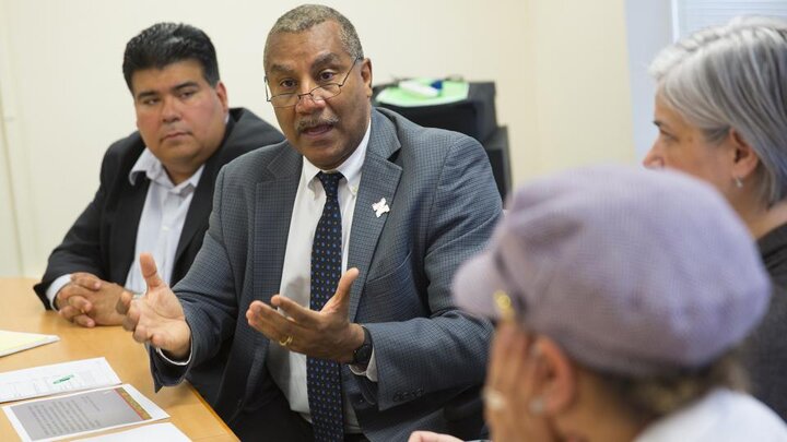 Dean Joseph Francisco meets with faculty