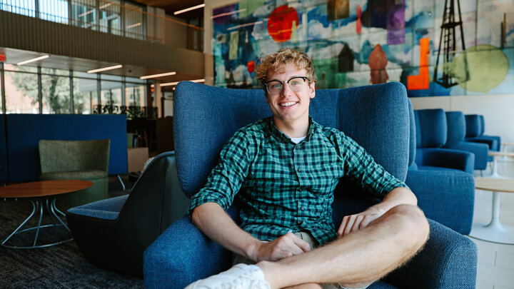 Pechous pictured here in the new Carolyn Pope Edwards Hall. Pechous is a Special Education & Political Science double major from Omaha.  