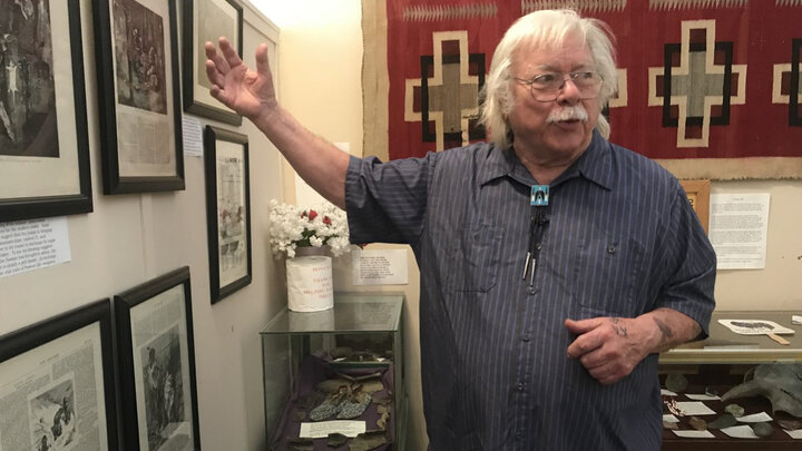 Roger Welsch shows the filmmakers a collection of historical articles and photos about the Pawnee Nation in Dannebrog, Nebraska.