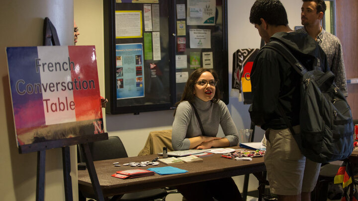 Language Fair student at table