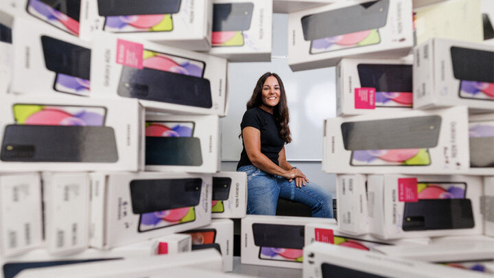 Kimberly Tyler with cellphone boxes