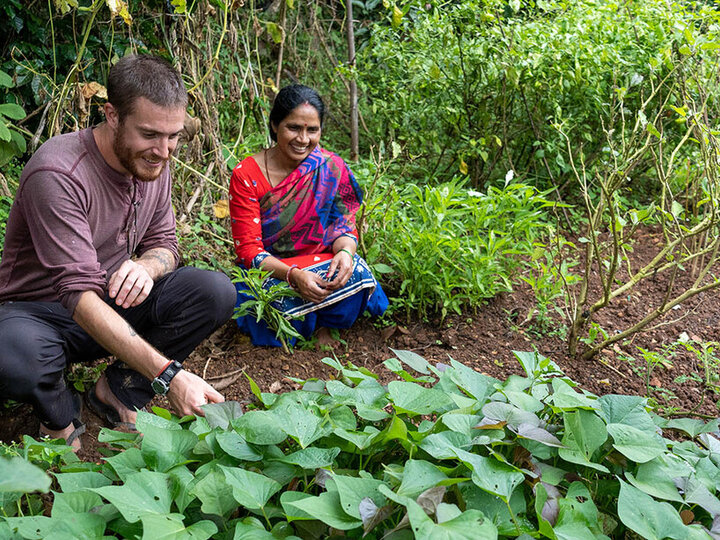 Peace Corps trainee with another person