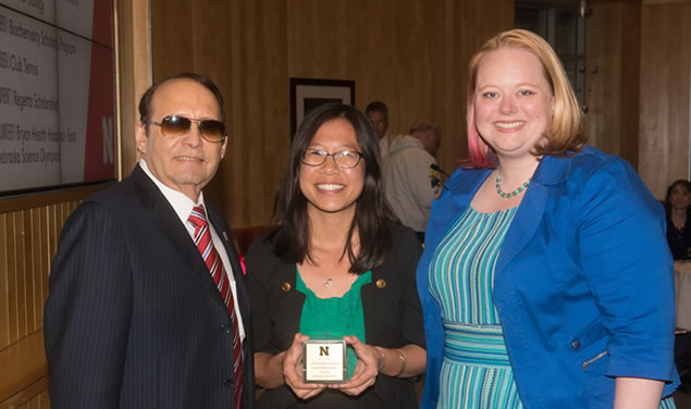 Juan Franco, Truong, and Dr. Burnett at the Outstanding Student Leadership Awards banquet